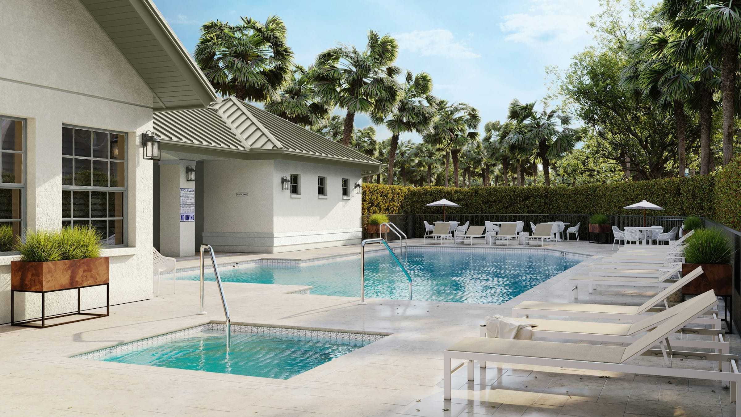 Community pool in Southwest Florida surrounded by palms